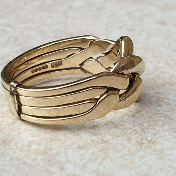 Four piece Puzzle Ring in 9ct Gold, a UK P 1/2 or a US 8. Gems Afire