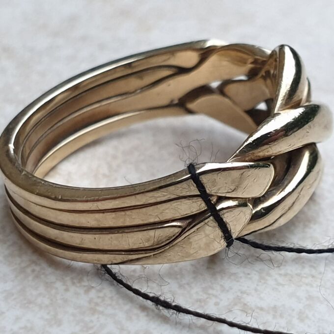 Four Piece Puzzle Ring in 9ct Gold, a UK N 1/2 or a US 7 1/2 Gems